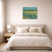 Gallery-wrapped canvas print of Vincent van Gogh's Field with Flowers Near Arles displayed on a wall in a bedroom