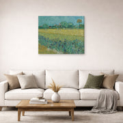 Gallery-wrapped canvas print of Vincent van Gogh's Field with Flowers Near Arles displayed on a wall in a living room