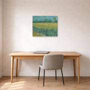 Gallery-wrapped canvas print of Vincent van Gogh's Field with Flowers Near Arles displayed on a wall in a home office