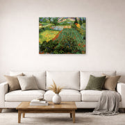 Gallery-wrapped canvas print of Vincent van Gogh's Field with Poppies displayed on a wall in a living room