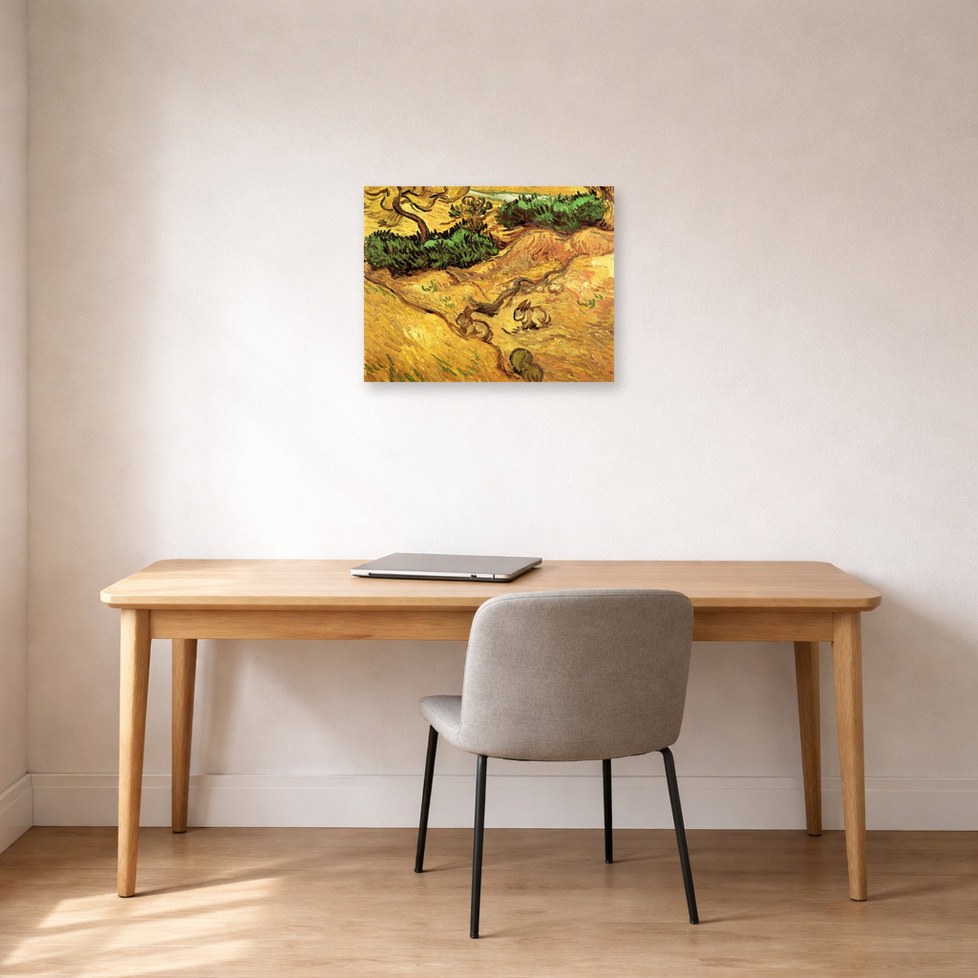 Unframed poster print of Vincent van Gogh's Field with Two Rabbits displayed on a wall in a home office