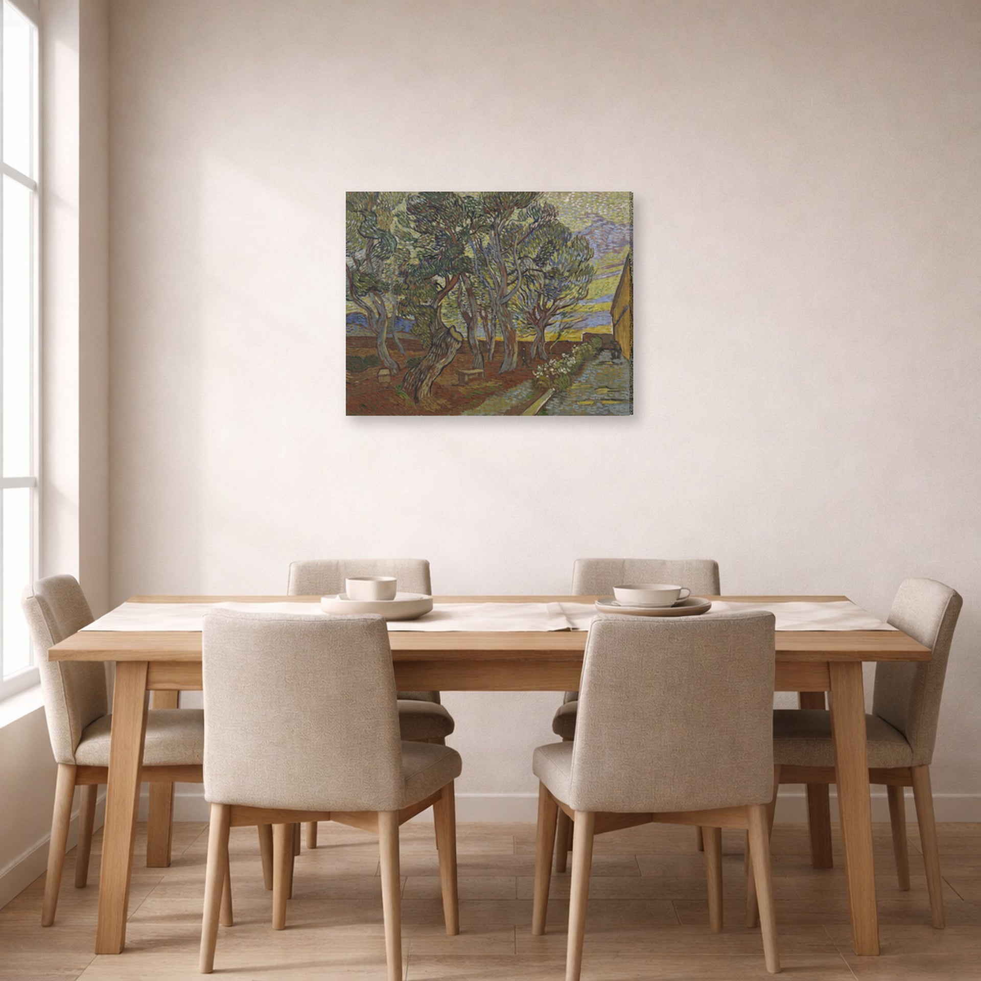 Gallery-wrapped canvas print of Vincent van Gogh's Garden of the Asylum displayed on a wall in a dining room