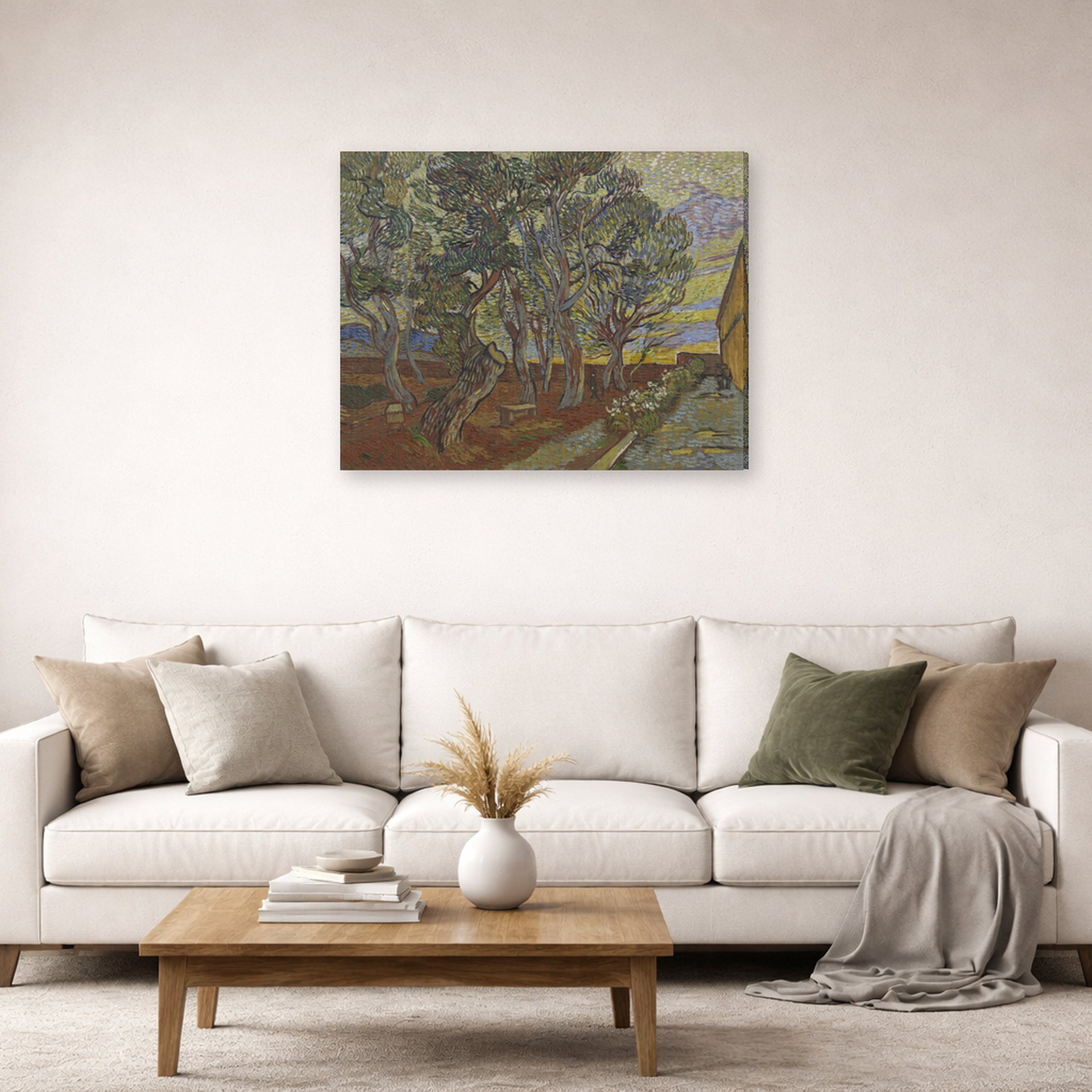 Gallery-wrapped canvas print of Vincent van Gogh's Garden of the Asylum displayed on a wall in a living room