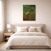 Unframed poster print of Vincent van Gogh's Gauguin's Chair displayed on a wall in a bedroom