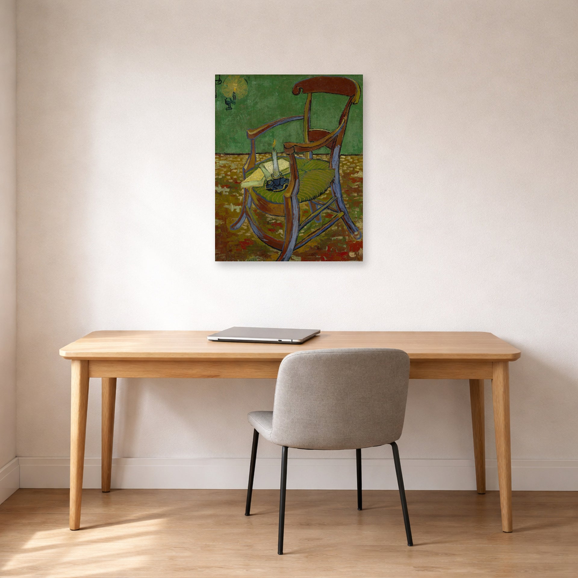 Unframed poster print of Vincent van Gogh's Gauguin's Chair displayed on a wall in a home office