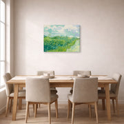 Gallery-wrapped canvas print of Vincent van Gogh's Green Wheat Fields, Auvers displayed on a wall in a dining room