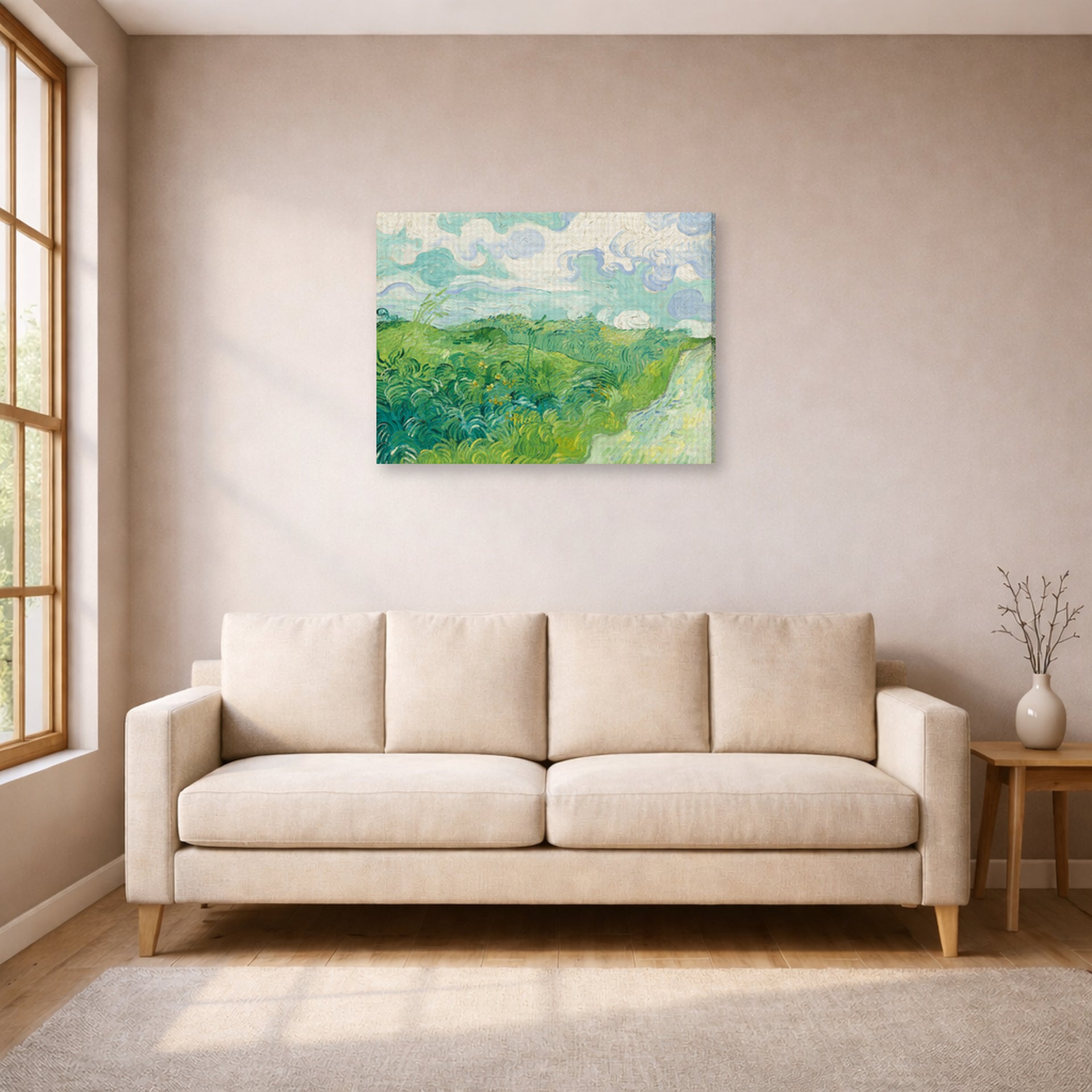 Gallery-wrapped canvas print of Vincent van Gogh's Green Wheat Fields, Auvers displayed on a wall in a living room