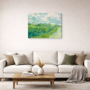 Gallery-wrapped canvas print of Vincent van Gogh's Green Wheat Fields, Auvers displayed on a wall in a living room