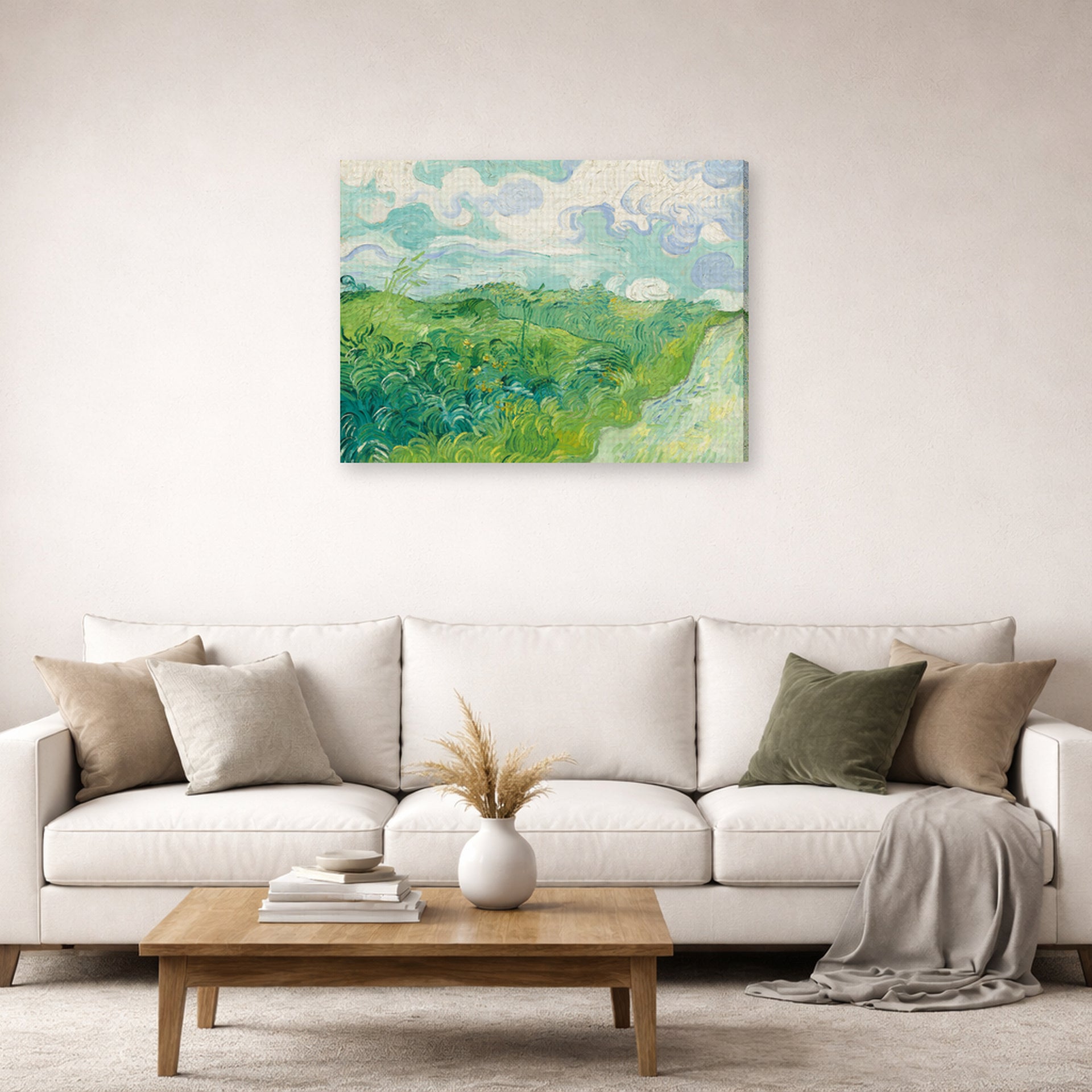 Gallery-wrapped canvas print of Vincent van Gogh's Green Wheat Fields, Auvers displayed on a wall in a living room