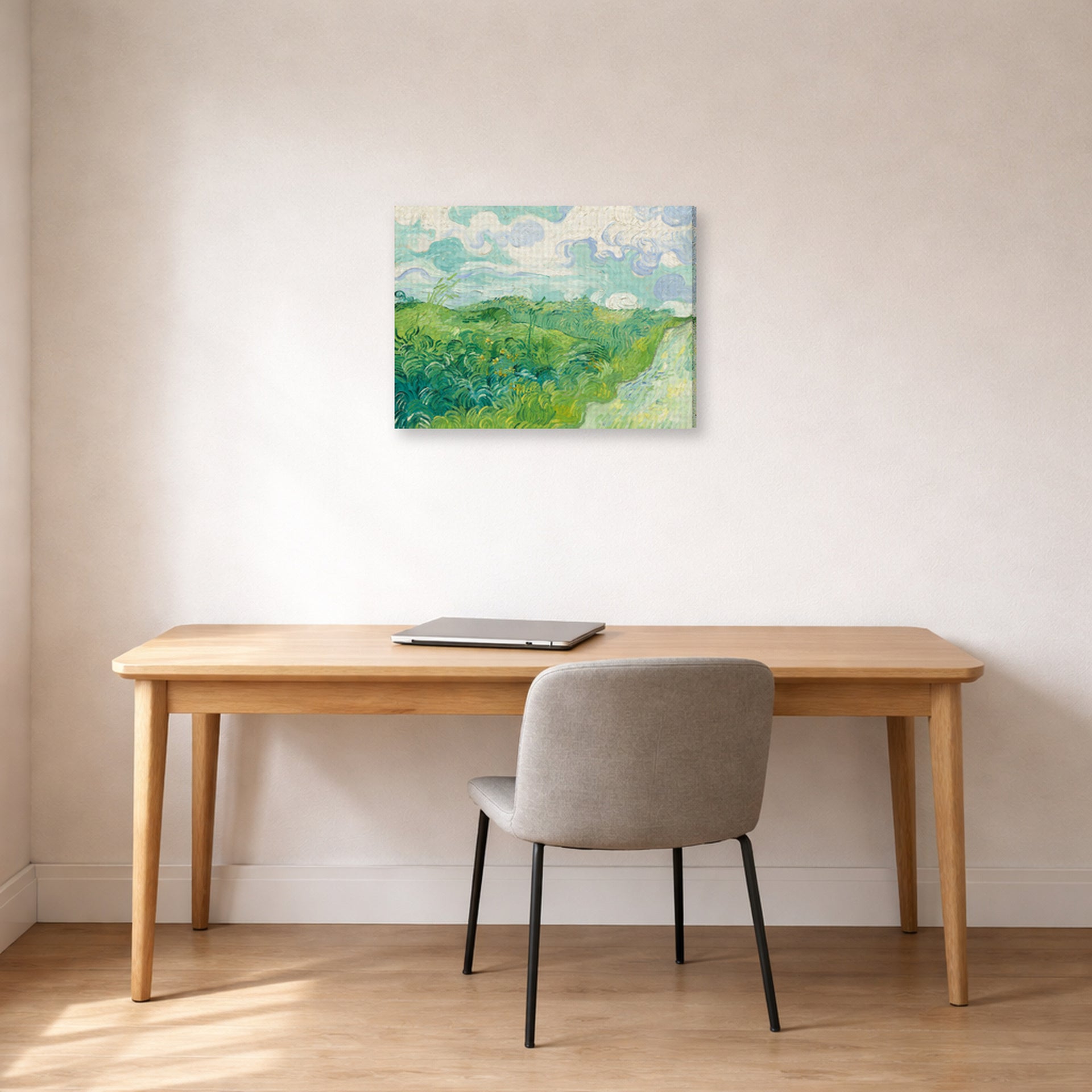Gallery-wrapped canvas print of Vincent van Gogh's Green Wheat Fields, Auvers displayed on a wall in a home office