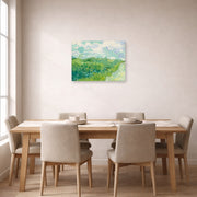 Unframed poster print of Vincent van Gogh's Green Wheat Fields, Auvers displayed on a wall in a dining room
