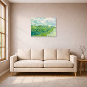 Unframed poster print of Vincent van Gogh's Green Wheat Fields, Auvers displayed on a wall in a living room