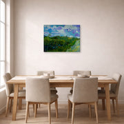 Gallery-wrapped canvas print of Vincent van Gogh's Green Wheat Fields displayed on a wall in a dining room