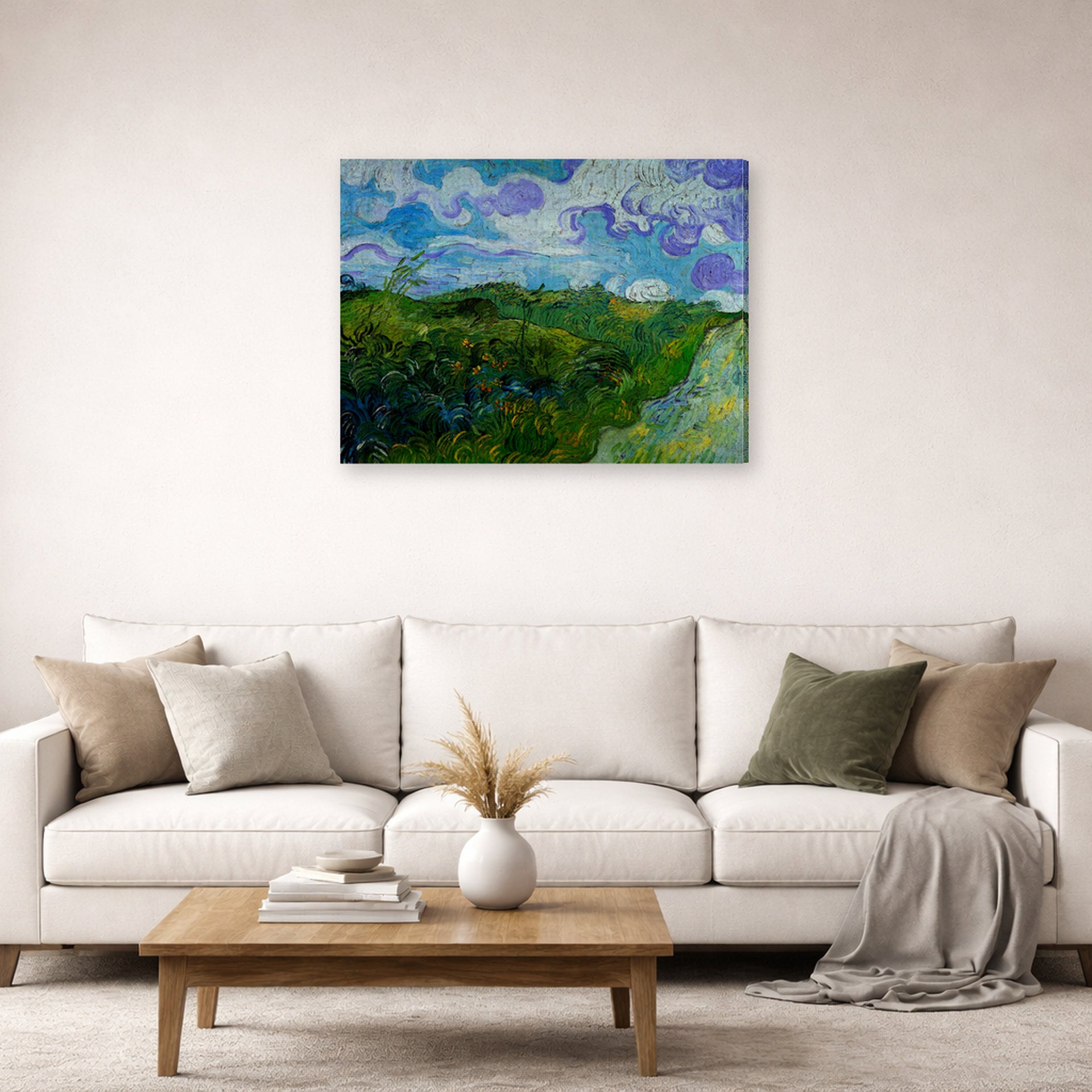Gallery-wrapped canvas print of Vincent van Gogh's Green Wheat Fields displayed on a wall in a living room