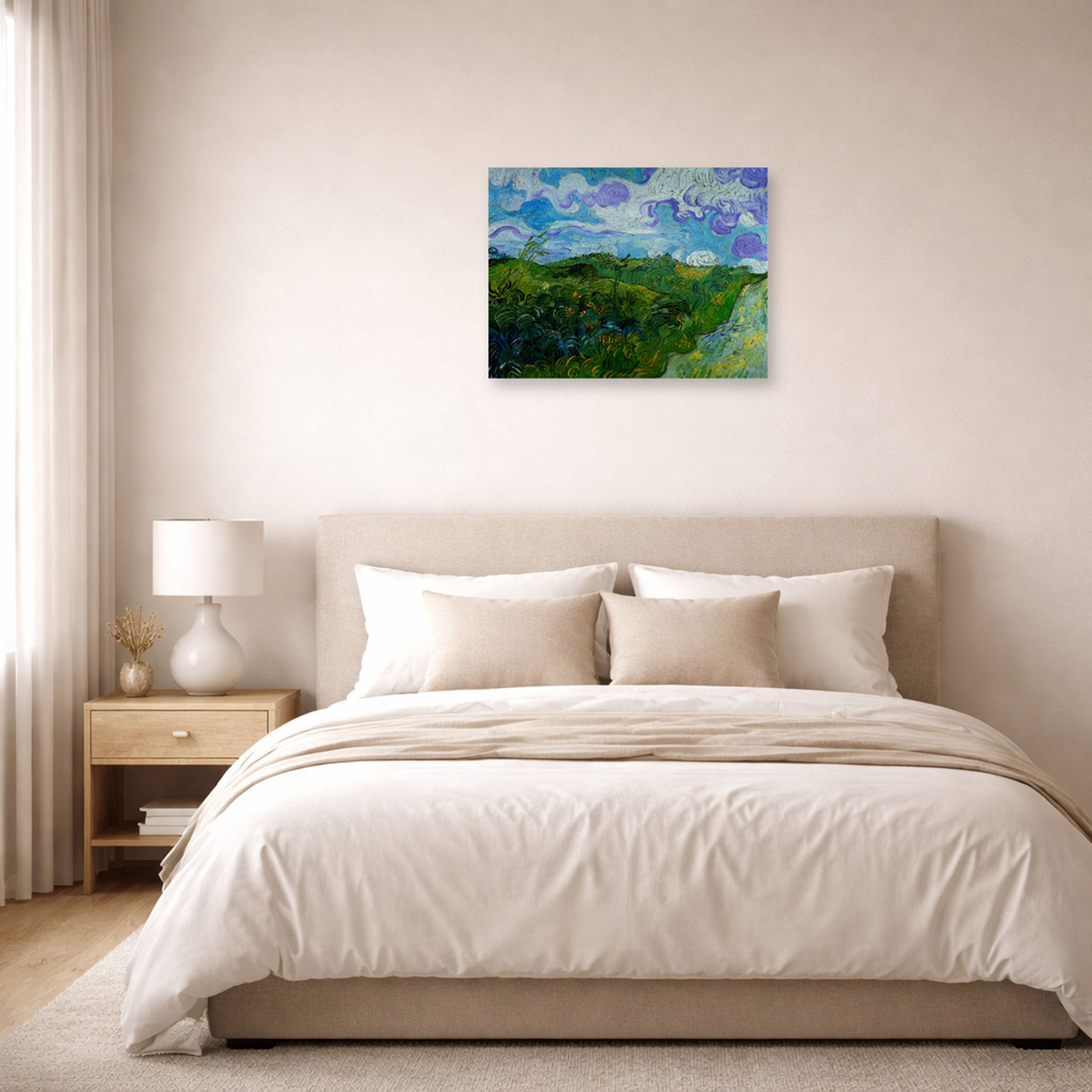 Unframed poster print of Vincent van Gogh's Green Wheat Fields displayed on a wall in a bedroom