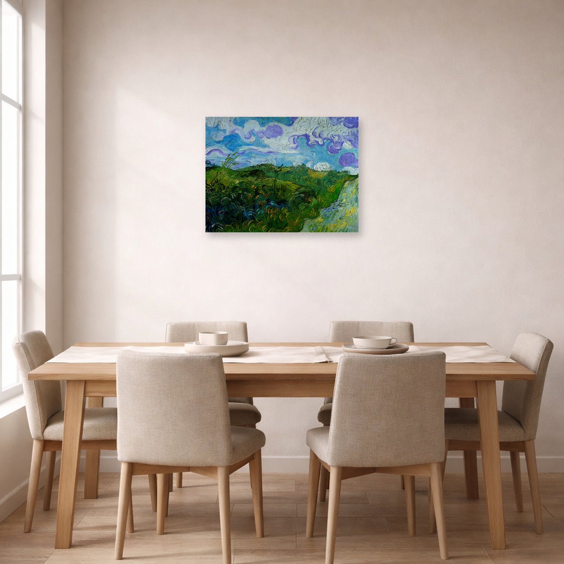 Unframed poster print of Vincent van Gogh's Green Wheat Fields displayed on a wall in a dining room