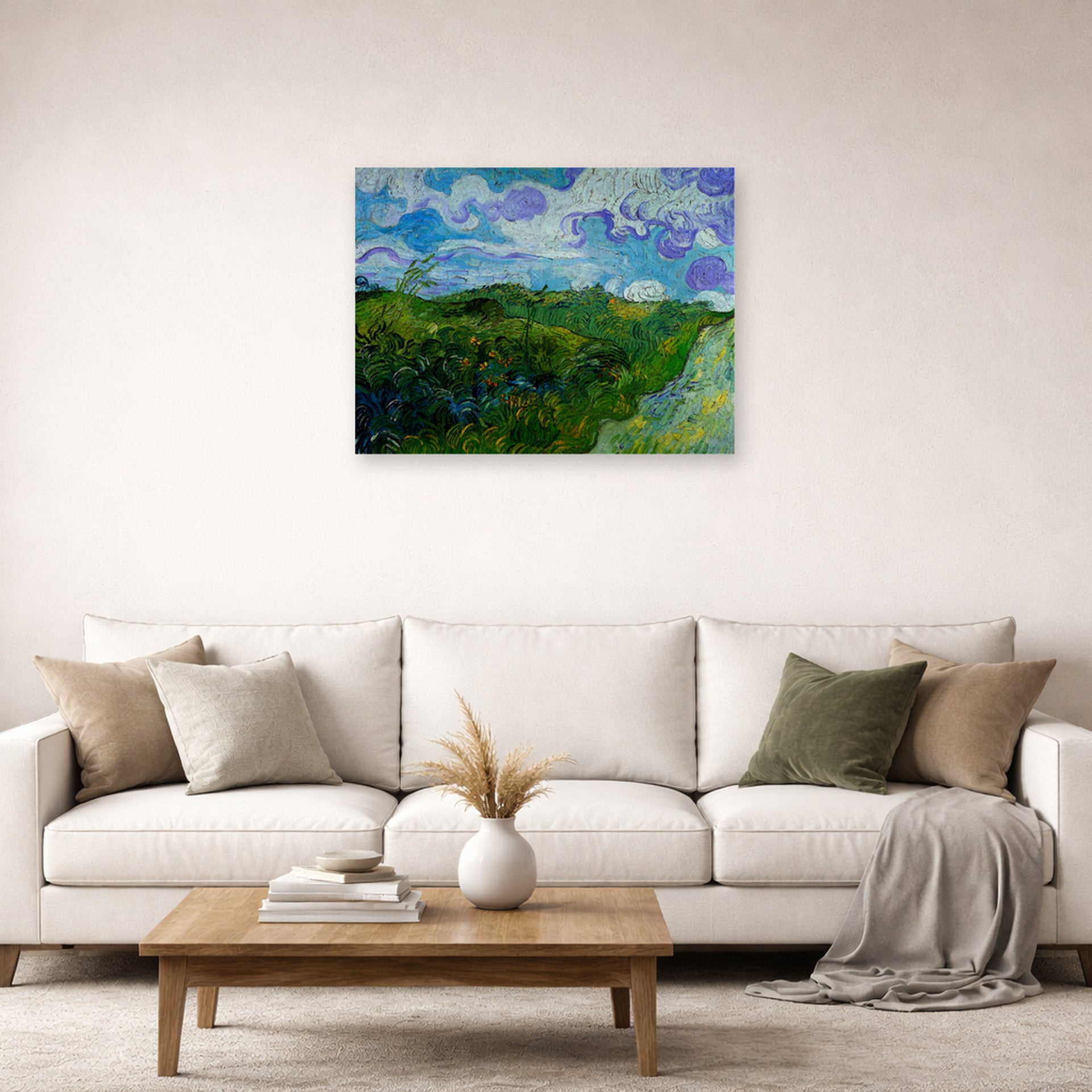 Unframed poster print of Vincent van Gogh's Green Wheat Fields displayed on a wall in a living room