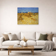 Gallery-wrapped canvas print of Vincent van Gogh's Harvest in Provence displayed on a wall in a living room
