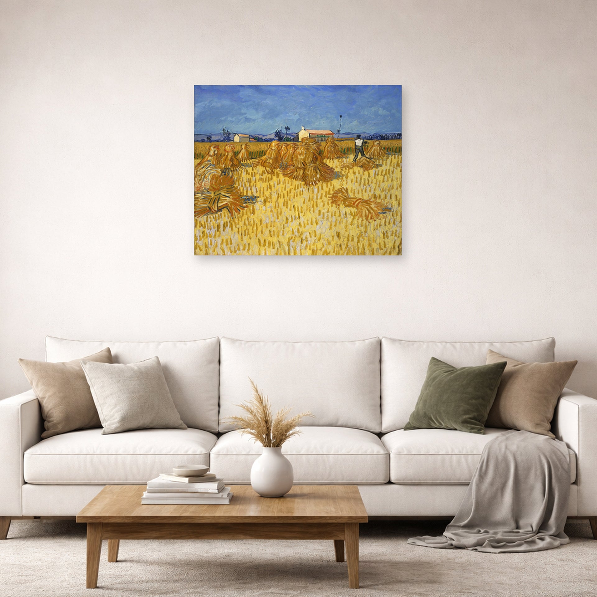 Unframed poster print of Vincent van Gogh's Harvest in Provence displayed on a wall in a living room