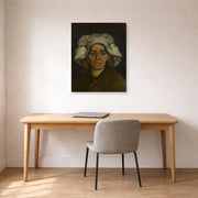 Gallery-wrapped canvas print of Vincent van Gogh's Head of a Woman displayed on a wall in a home office