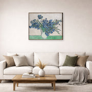 Gallery-wrapped canvas print of Vincent van Gogh's Irises and Roses displayed on a wall in a living room