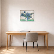 Unframed poster print of Vincent van Gogh's Irises and Roses displayed on a wall in a home office