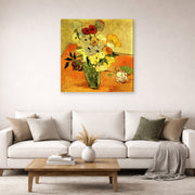 Gallery-wrapped canvas print of Vincent van Gogh's Japanese Vase with Roses and Anemones displayed on a wall in a living room
