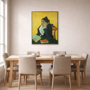 Gallery-wrapped canvas print of Vincent van Gogh's L'arlesienne: Madame Ginoux with Gloves and Umbrella displayed on a wall in a dining room