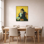 Unframed poster print of Vincent van Gogh's L'arlesienne: Madame Ginoux with Gloves and Umbrella displayed on a wall in a dining room