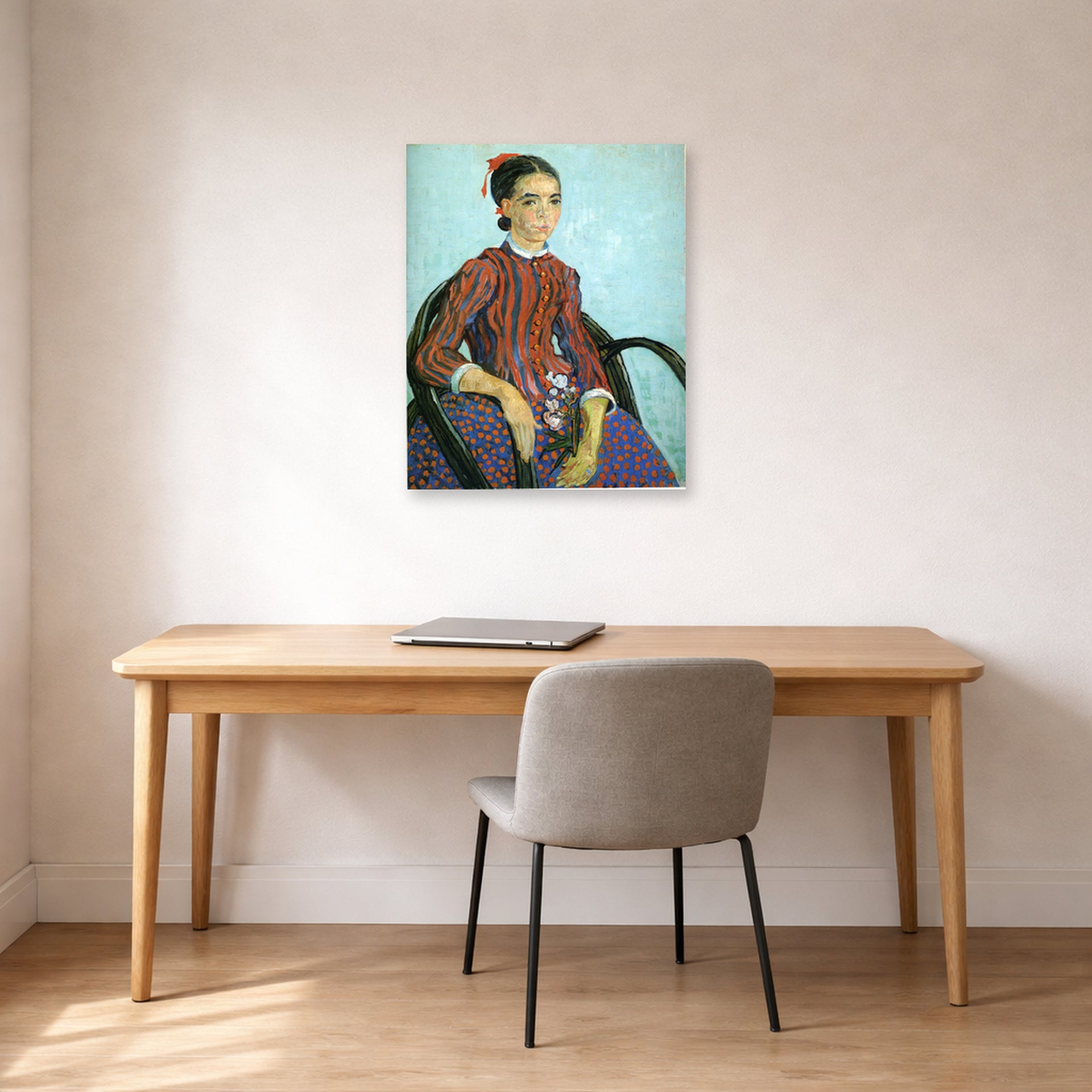 Unframed poster print of Vincent van Gogh's La Mousme displayed on a wall in a home office