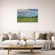 Gallery-wrapped canvas print of Vincent van Gogh's Landscape Under a Stormy Sky displayed on a wall in a living room