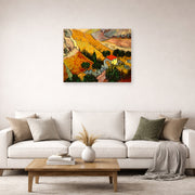 Unframed poster print of Vincent van Gogh's Landscape with House and Ploughman displayed on a wall in a living room