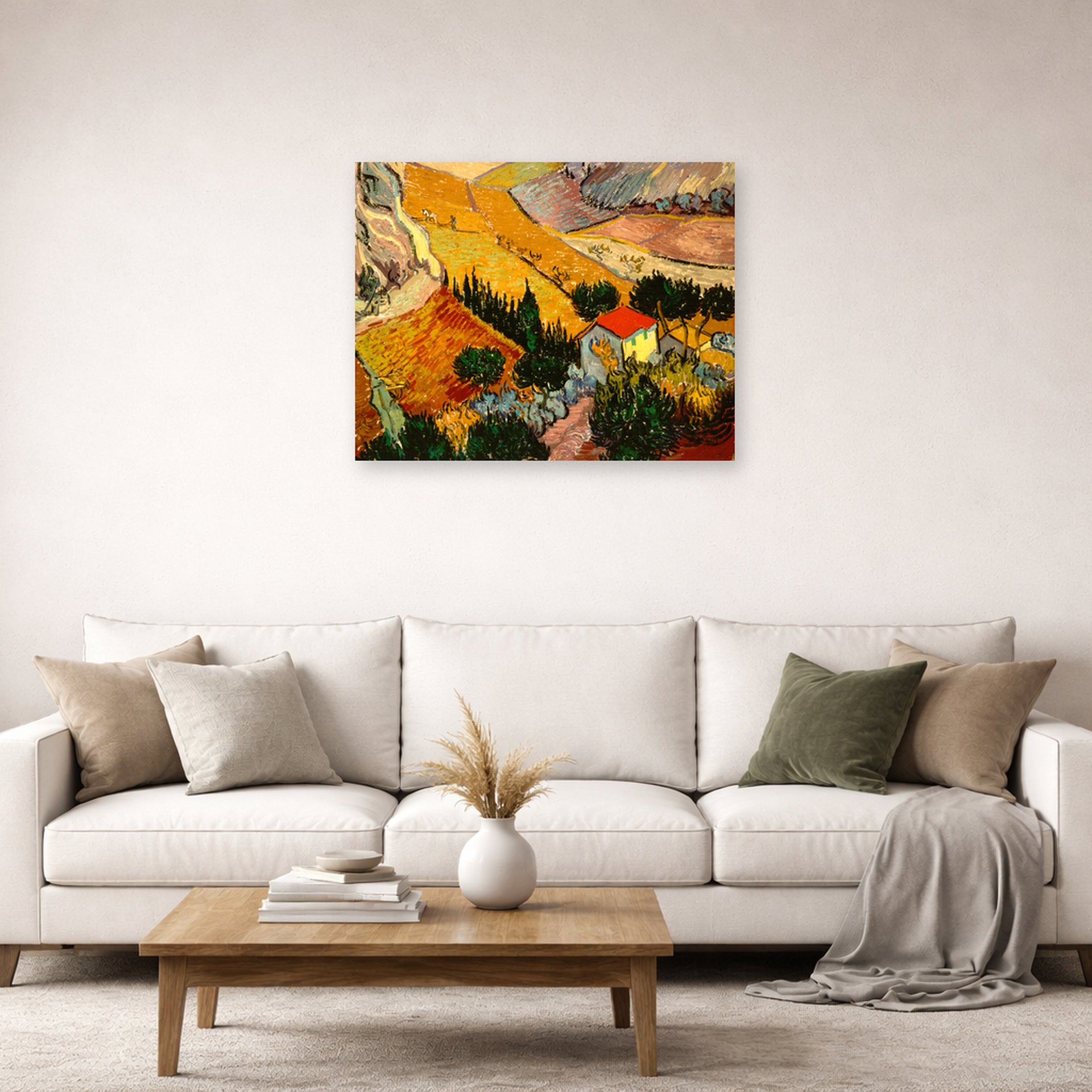 Unframed poster print of Vincent van Gogh's Landscape with House and Ploughman displayed on a wall in a living room