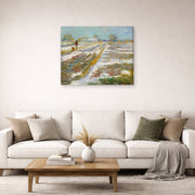 Gallery-wrapped canvas print of Vincent van Gogh's Landscape with Snow displayed on a wall in a living room