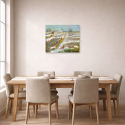 Unframed poster print of Vincent van Gogh's Landscape with Snow displayed on a wall in a dining room