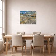 Gallery-wrapped canvas print of Vincent van Gogh's Landscape at Saint Rimy displayed on a wall in a dining room