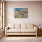 Gallery-wrapped canvas print of Vincent van Gogh's Landscape at Saint Rimy displayed on a wall in a living room