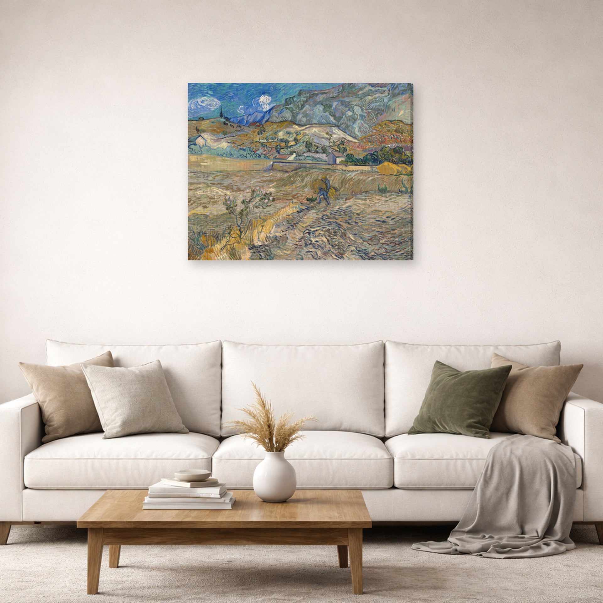 Gallery-wrapped canvas print of Vincent van Gogh's Landscape at Saint Rimy displayed on a wall in a living room