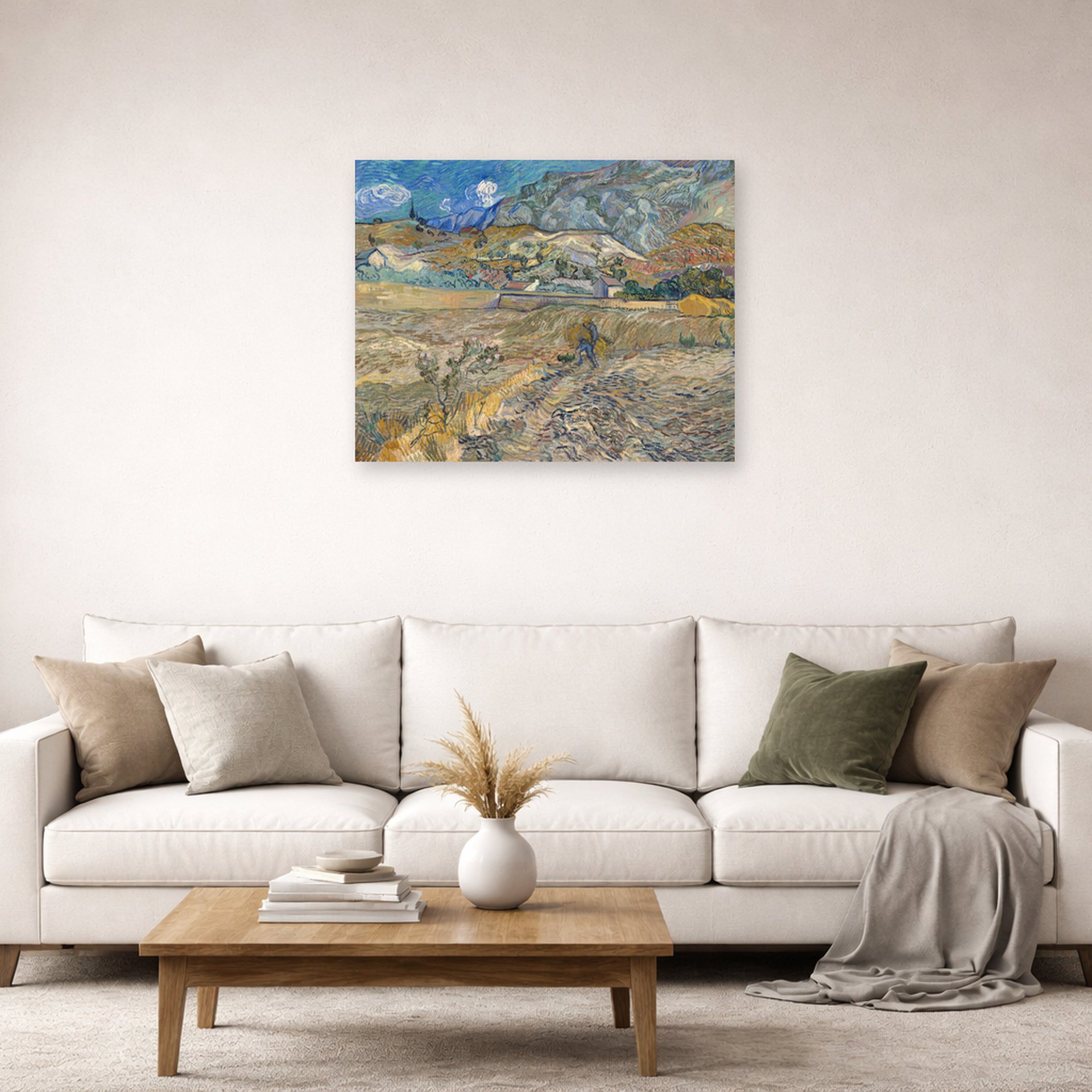Unframed poster print of Vincent van Gogh's Landscape at Saint Rimy displayed on a wall in a living room
