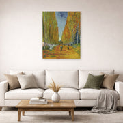 Unframed poster print of Vincent van Gogh's Les Alyscamps displayed on a wall in a living room