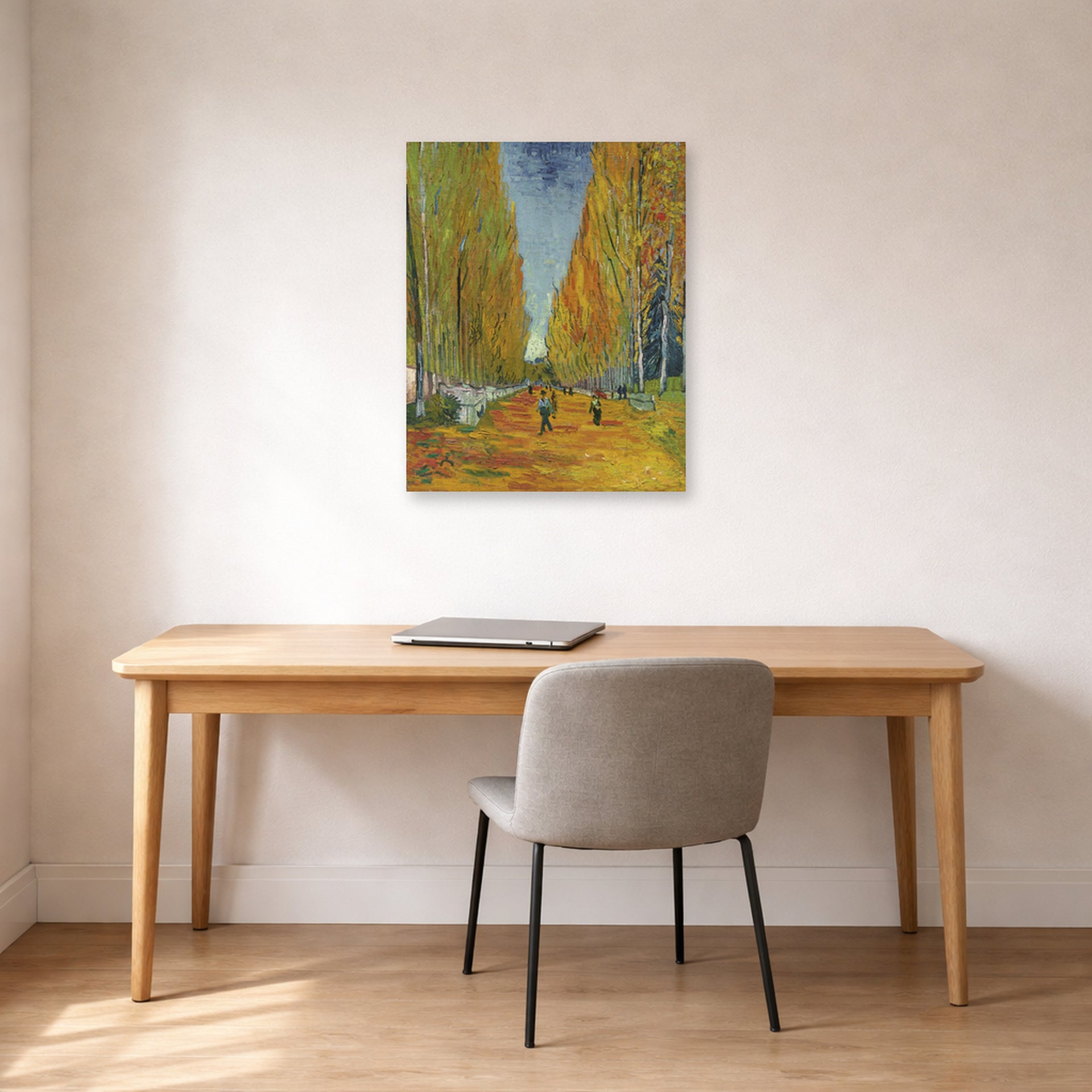 Unframed poster print of Vincent van Gogh's Les Alyscamps displayed on a wall in a home office