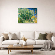 Unframed poster print of Vincent van Gogh's Lilac Bush displayed on a wall in a living room