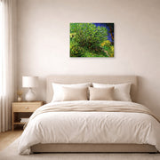 Gallery-wrapped canvas print of Vincent van Gogh's Lilacs displayed on a wall in a bedroom