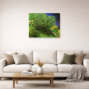 Unframed poster print of Vincent van Gogh's Lilacs displayed on a wall in a living room