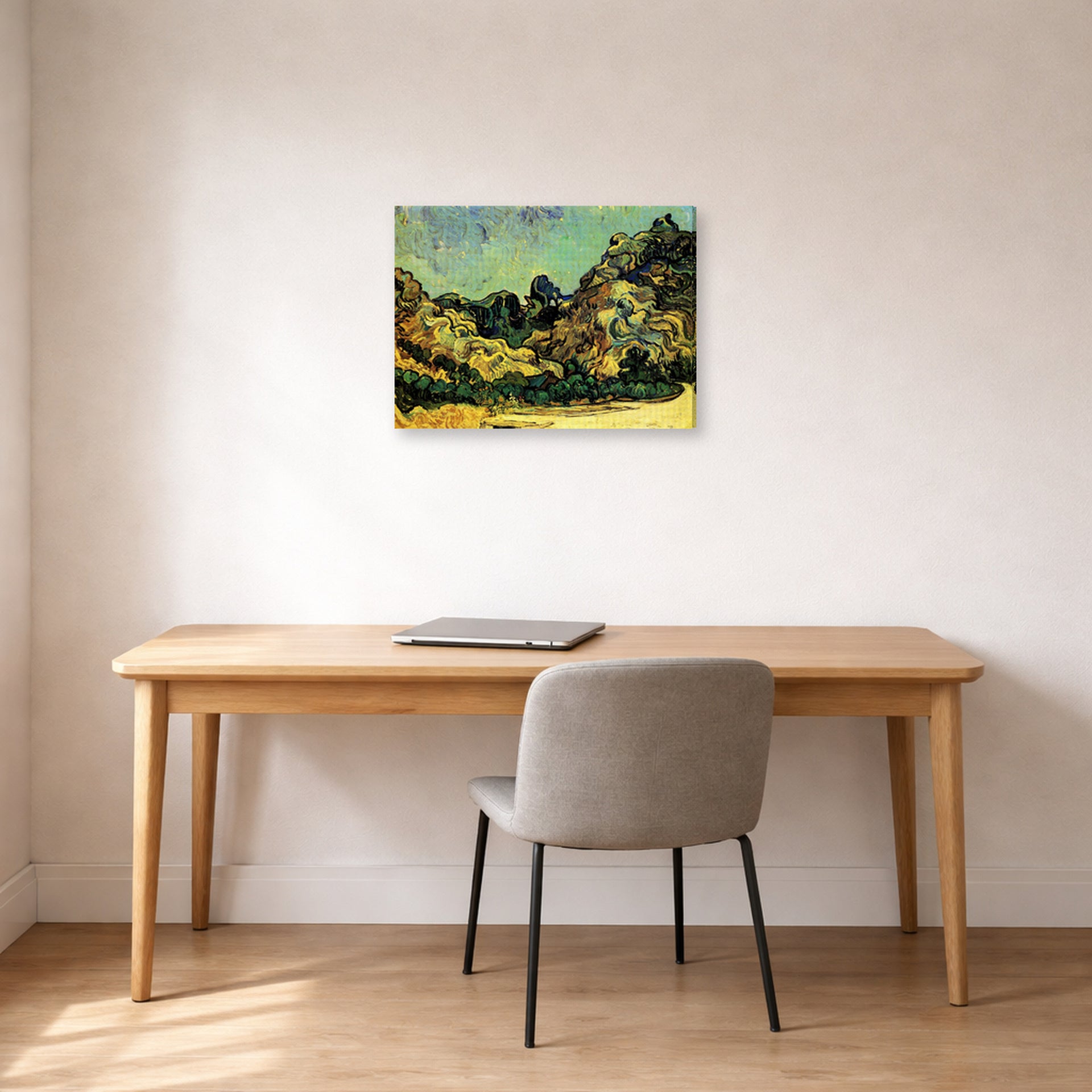 Gallery-wrapped canvas print of Vincent van Gogh's Mountains at Saint Remy with Dark Cottage displayed on a wall in a home office