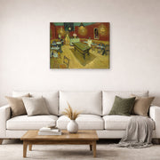 Gallery-wrapped canvas print of Vincent van Gogh's Night Café displayed on a wall in a living room