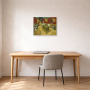 Unframed poster print of Vincent van Gogh's Night Café displayed on a wall in a home office
