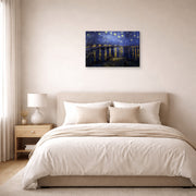 Gallery-wrapped canvas print of Vincent van Gogh's Night over the Rhone displayed on a wall in a bedroom