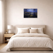 Unframed poster print of Vincent van Gogh's Night over the Rhone displayed on a wall in a bedroom
