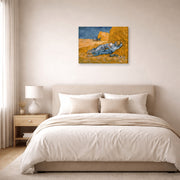 Gallery-wrapped canvas print of Vincent van Gogh's Noon Rest from Work displayed on a wall in a bedroom